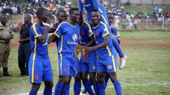 KCCA players congratulate goalscorer Derrick Nsibambi