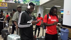 Aucho with Hassan Wasswa at Entebbe International Airport