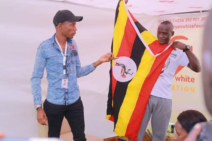 Tugume with Bryan White after returning from the US