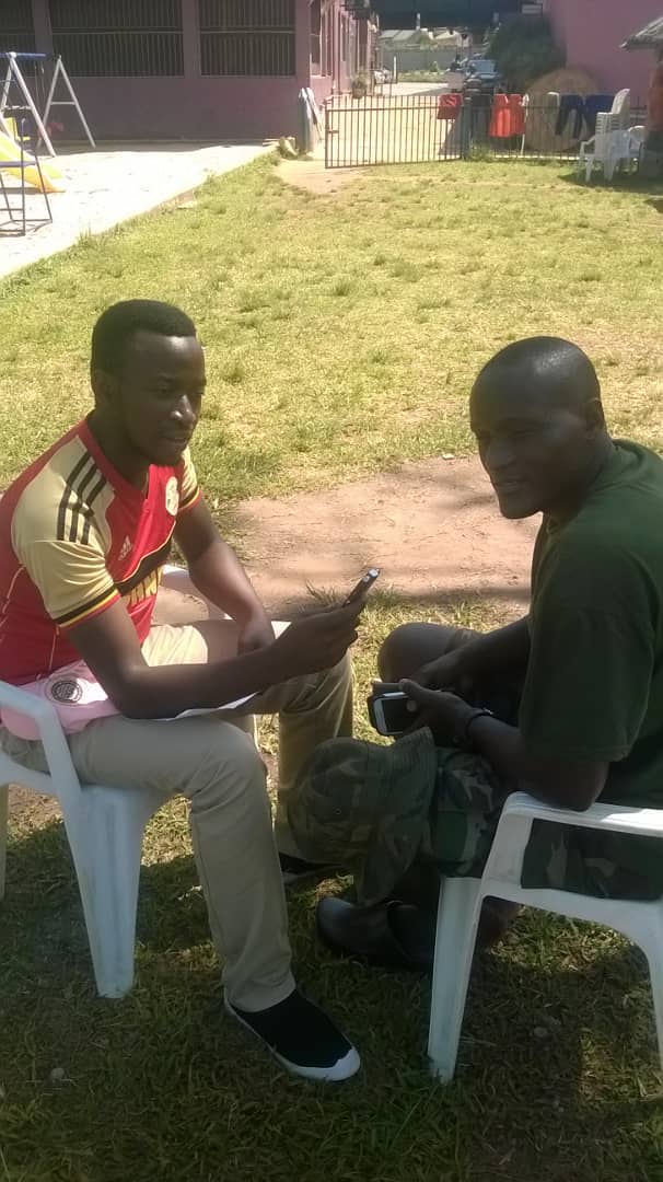 Galaxy FM reporter, Huzaifa interwing Tutus Tugume at Auto Spa, Munyonyo