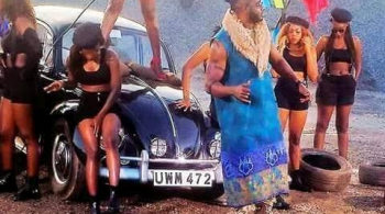 Bebe in his dress-like attire