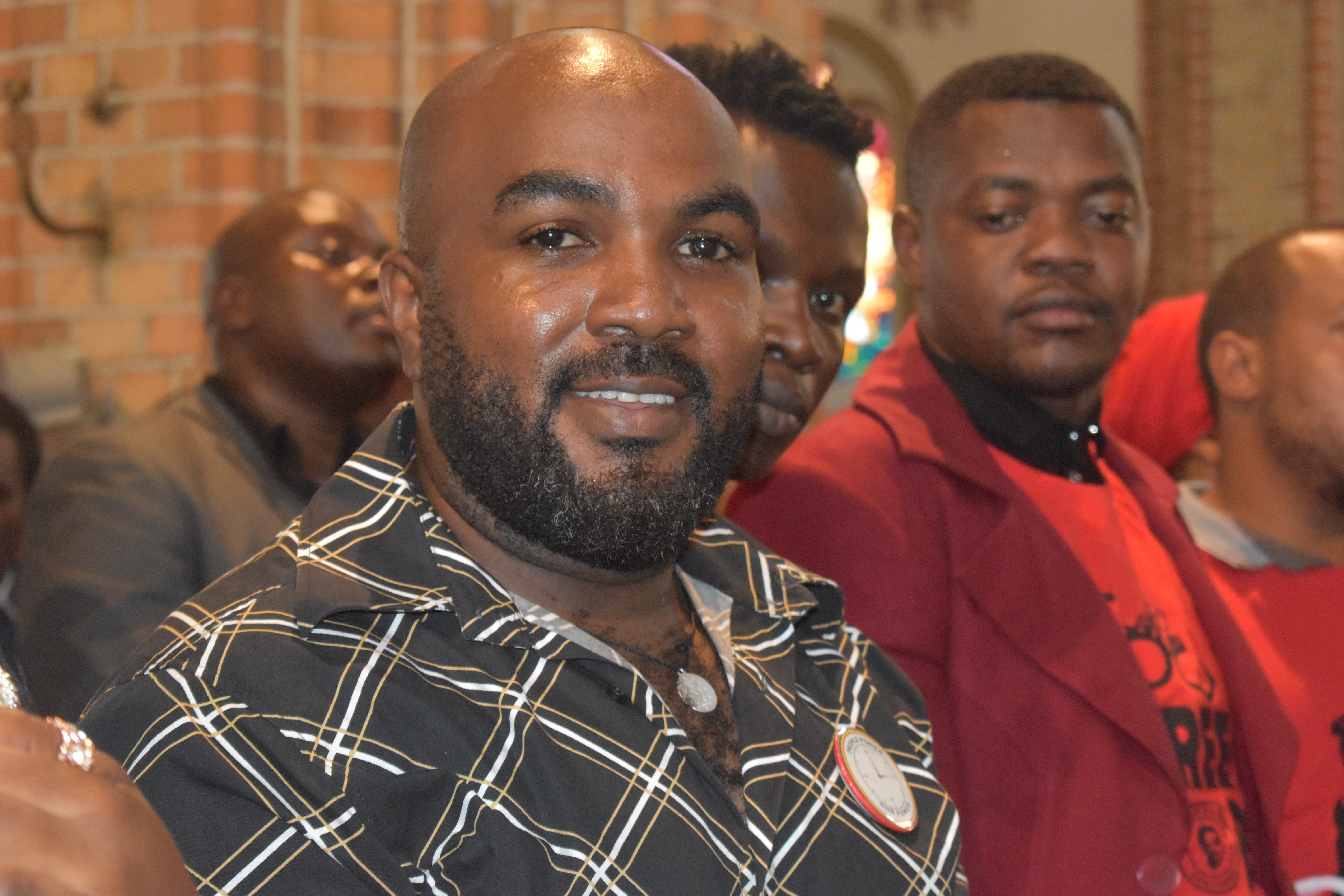 Bobi Wine's head of security team Eddie Mutwe was in high spirits at the prayer service in Rubaga Cathedral