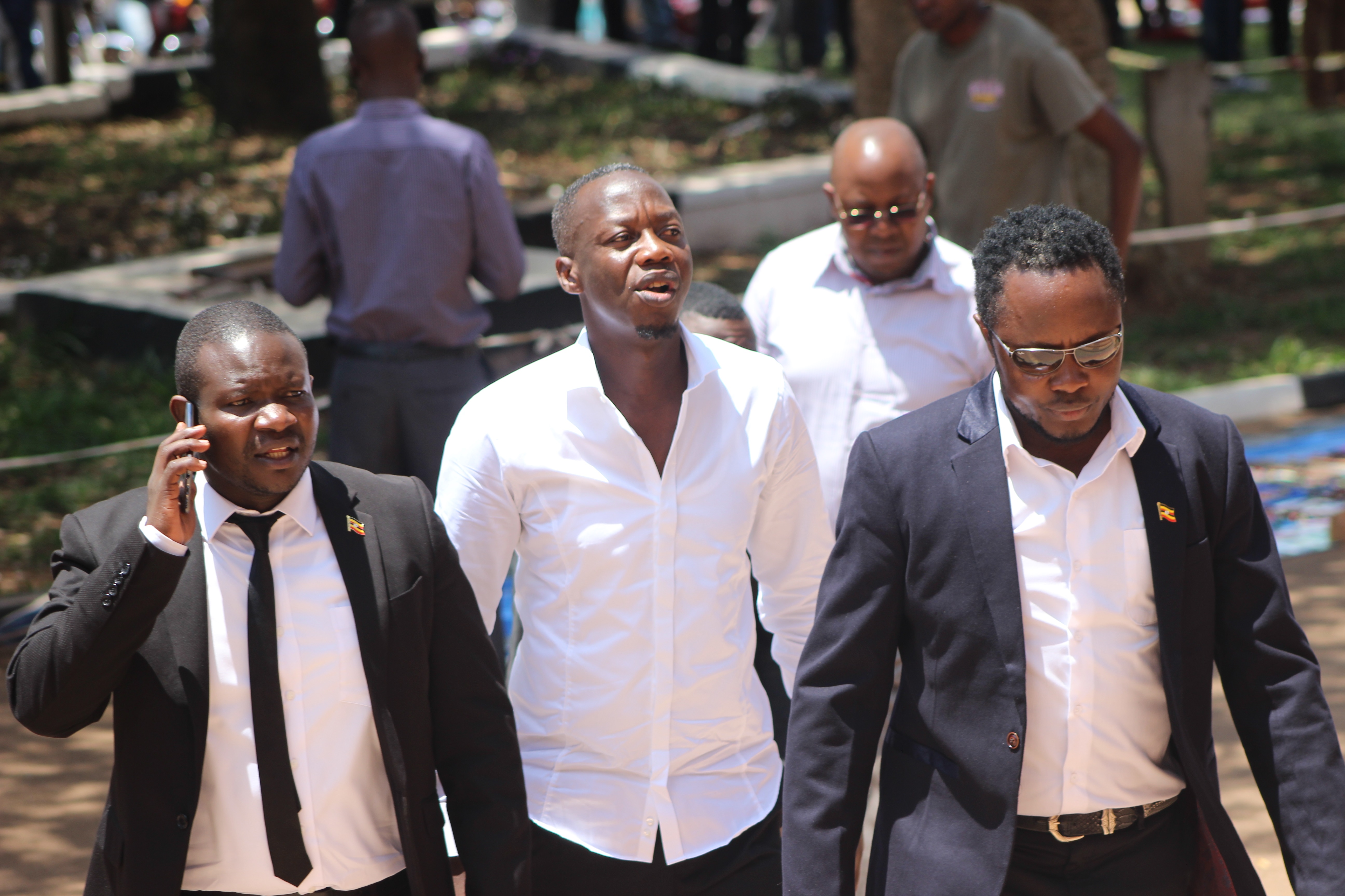 L-R Rema's manager Kayemba, Mesarch Ssemakula, Hilderman arriving at the Cathedral in Rubaga