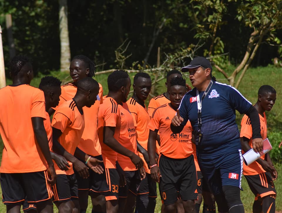 Vipers Sc new head coach, Javier Martinez (in Blue with a cap) instructing players during training