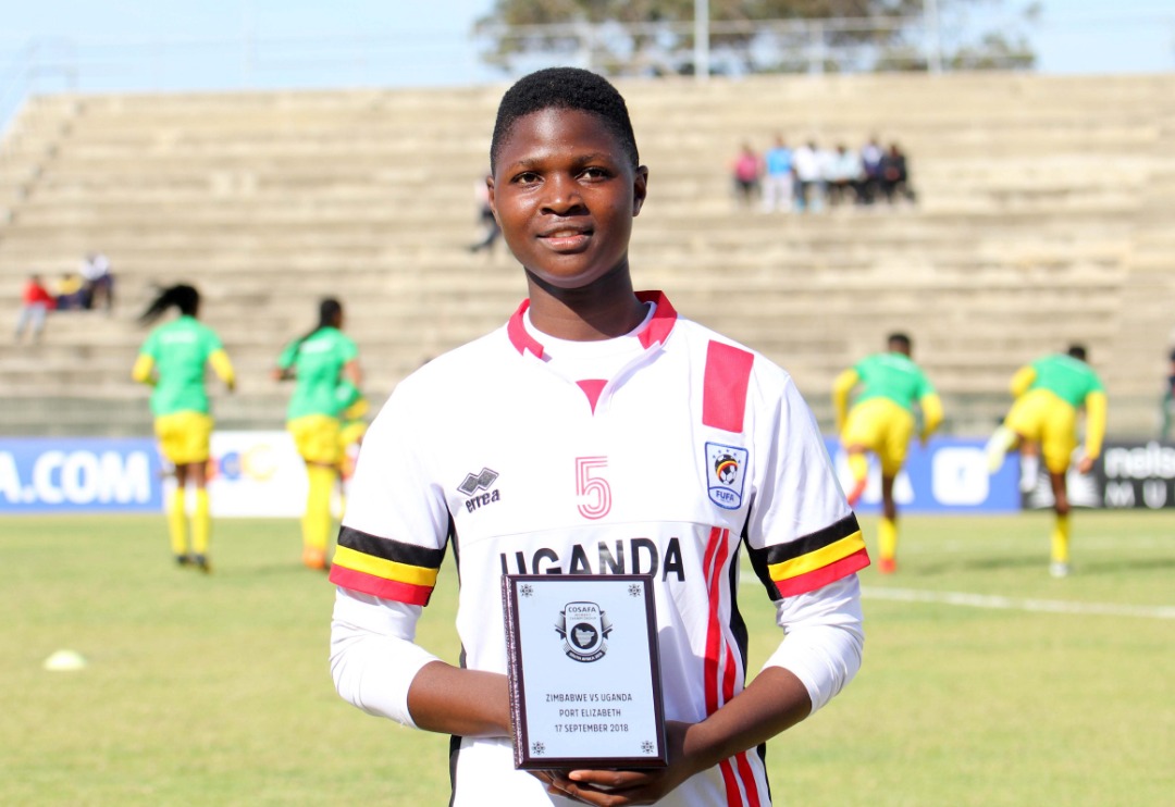Crested Cranes defender Shadia Nankya displaying her Man Of the Match accolade after the match against Zimbabwe