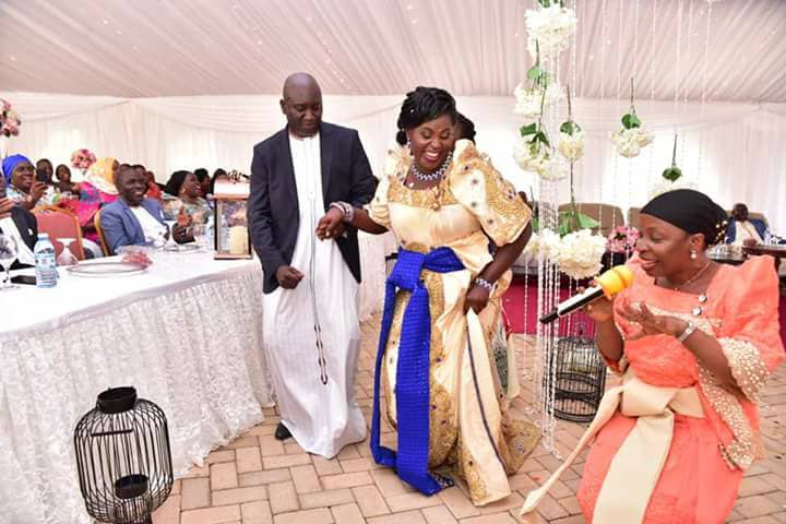 Mulindwa dancing with daughter, Claire