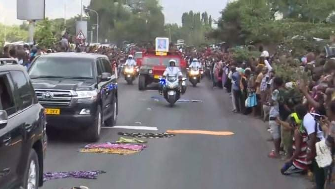 Tanzanians flocked to the streets to catch a glimpse of the convoy carrying Magufuli's body
