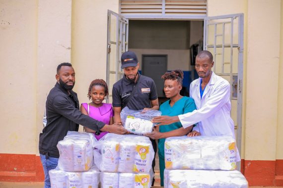 Muhangi handing over mama kits to the hospital administrators